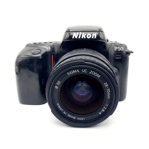 Nikon f50 sigma zoom - +, af